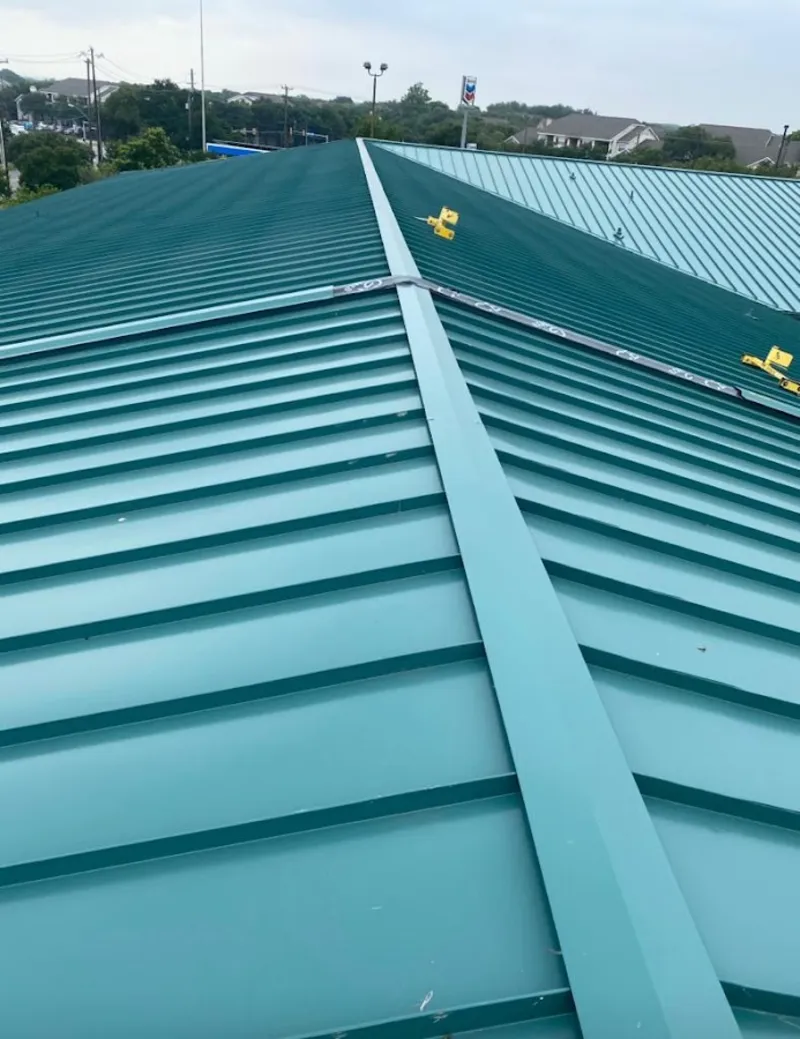 Green commercial metal roof ridge and valley for Metal Roof Repair in Stanford
